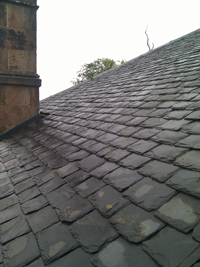 Picture showing slate roof repaired by SDM